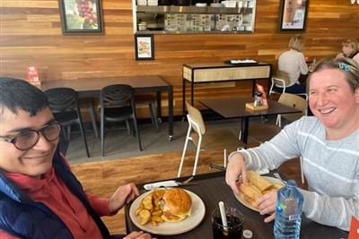 Two people having lunch at a Cafe